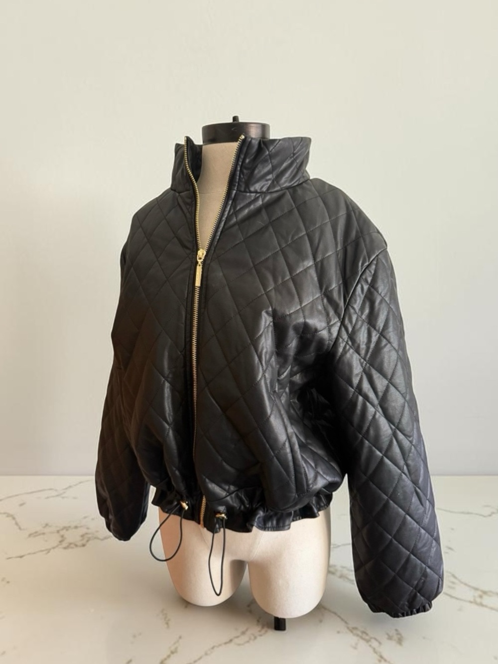 Black Quilted Bomber Jacket with Gold Zip